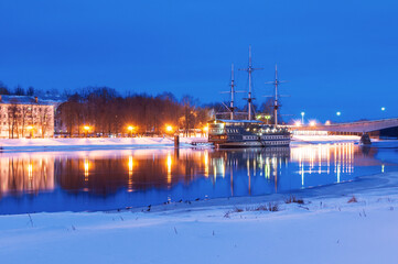 Frigate Flagship restaurant near the Embankment of Alexander Nevsky at the Volkhov river in Veliky...