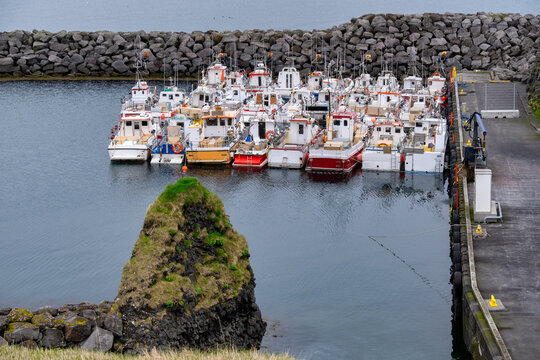 Rows of boats moored in a harbour, Arnarstapi, Snaefellsnes Peninsula, Iceland