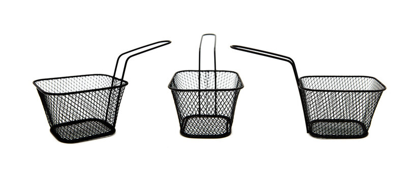 Empty black wire chip or French fries serving deep fryer basket isolated on white background with clipping path and copy space. Small metal wire frying basket. View from all sides.