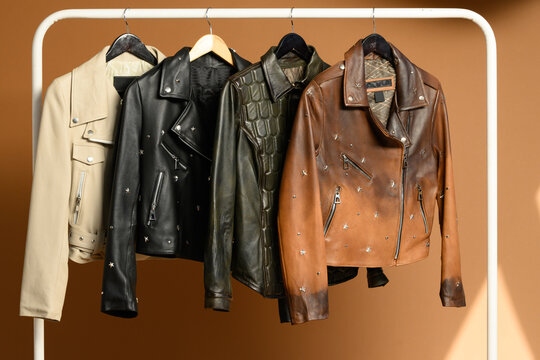 rack with jackets and leather goods in showroom