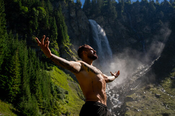 Tourist breathing and relax in nature. Meditation, spiritual wellness. Calm, athlete and freedom in environment. Training mindfulness. Relaxed man in nature. Freedom and happiness lifestyle.