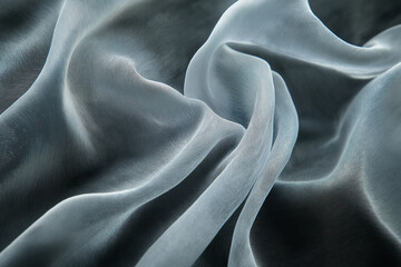 Obraz premium Fine silk fabric with a subtle shimmer, detailed fiber texture, flowing folds