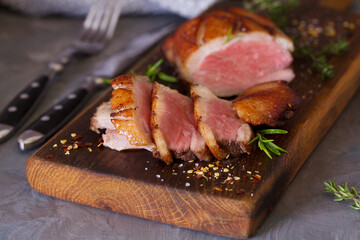 Roast duck breast fillets with rosemary and thyme