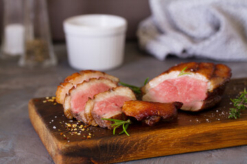 Roast duck breast fillets with rosemary and thyme