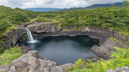 Tranquil Waterfall Cascading into Circular Pool