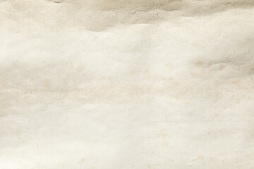 Old yellowed weathered paper with brown stains