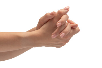Woman hands with nude manicure isolated on a white background.