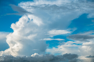 beautiful white cumulus clouds in blue sky, natural background, wallpaper