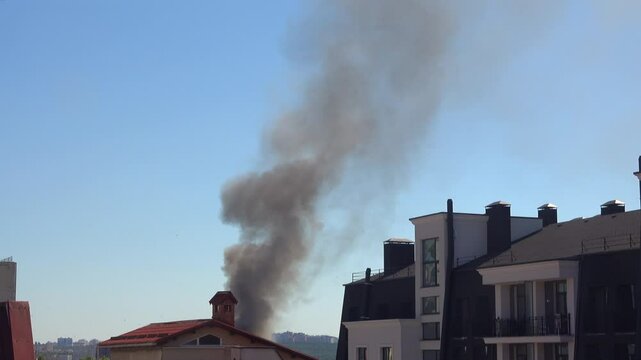 View of smoke coming out of a burning house