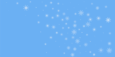 Snowflakes. Snow, snowfall. Falling scattered white snowflakes on a blue background.