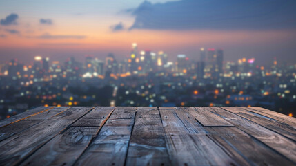 The empty wooden table top with blur background of sky lounge on rooftop with cityscape view