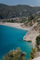 Fototapeta premium View of the beach with white sand and mountains
