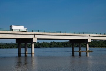modern road bridge across the White Nile river at Murchison falls national park in Uganda