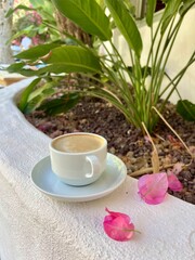 cup of coffee and flowers
