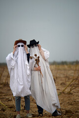 Halloween party, two ghosts 