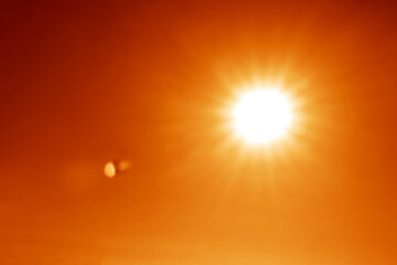 Flare light, effects sunlight, lens flare, light leaks, warm sun rays light effects, overlays or golden flare isolated on blue clear sky background. effect, sunlight, ray, glow, bright, shine, sun.