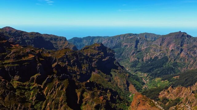 Enormous mountains covered with mosses. Aerial perspective on the rocks of the Madeira Islands, Portugal.