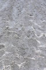 Obraz premium Close-up of white sand in a quarry, beach or desert