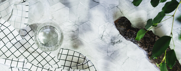Clear transparent water in glasses in natural background with shadows top view web banner