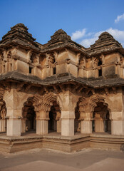 Obraz premium Lotus Mahal is an architectural masterpiece, a two-story structure with many open arches decorated with stucco lace. Hampi. India.