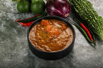 Indian cuisine - chicken curry with spices