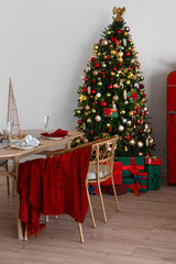 Dining table with Christmas setting in kitchen