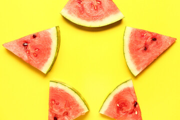 Frame made of fresh watermelons on yellow background