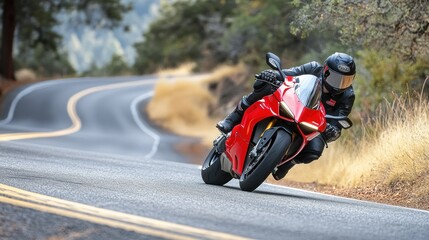 Naklejka premium Red Motorcycle Leaning Into A Turn On A Winding Road