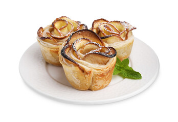 Freshly baked apple roses with mint isolated on white. Puff pastry