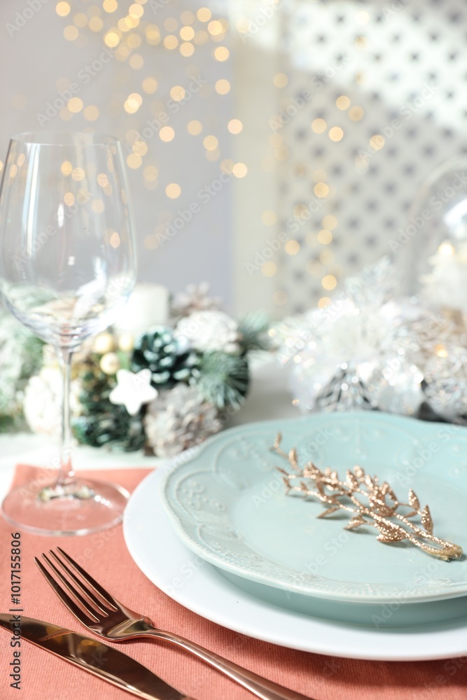 Canvas Prints Christmas place setting with plates, cutlery and festive decor on table, closeup