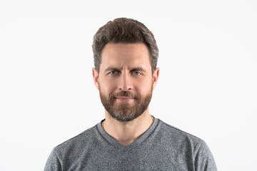 Fototapeta premium Studio close up portrait of the handsome man. A Hipster guy model headshot. Male face. Handsome man. Confident male model. Man looking proud. Closeup face of attractive man. Elegant guy.