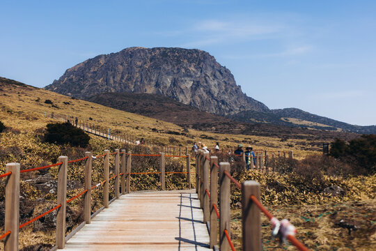 Hallasan National Park, Jeju island, South Korea, spring landscape view of Yeongsil trail, Halla volcano peak, trekking and climbing to Halla mountain, travel and hiking in Korea, Jeju-do, sunny day