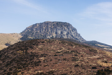 Hallasan National Park, Jeju island, South Korea, spring landscape view of Yeongsil trail, Halla volcano peak, trekking and climbing to Halla mountain, travel and hiking in Korea, Jeju-do, sunny day