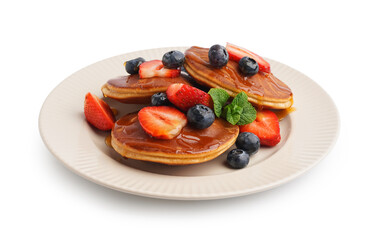 Tasty pancakes with blueberries and strawberry isolated on white background