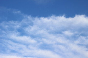 Bright blue sky with clouds