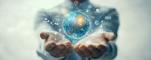 Businessman holding a digital globe with glowing technology icons representing global connectivity and innovation in technology