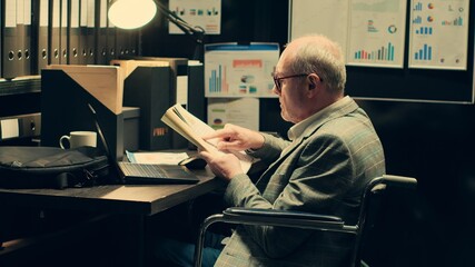 Senior inspector gathering all case files in a folder to study for new clues, uses forensic...