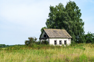 Old abandoned house on side of road