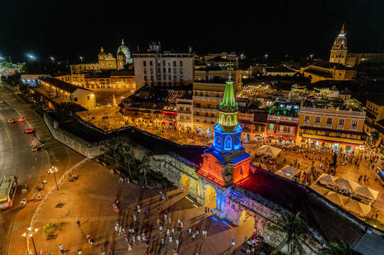 Beautiful Aerial view of the walled city of Cartagena de Indias in Colombia. Its Clock Tower entrance, the plaza, the sanctuary and the Domus Dei at night