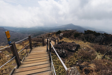 Hallasan National Park, Jeju island, South Korea, spring view of Yeongsil trail with wooden ladder path stairs, trekking and climbing, stairway to Halla mountain, hiking in Korea, Jeju-do, sunny day