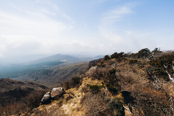 Hallasan National Park, Jeju island, South Korea, spring landscape view of Yeongsil trail, Halla volcano peak, trekking and climbing to Halla mountain, travel and hiking in Korea, Jeju-do, sunny day