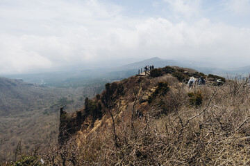 Hallasan National Park, Jeju island, South Korea, spring landscape view of Yeongsil trail, Halla volcano peak, trekking and climbing to Halla mountain, travel and hiking in Korea, Jeju-do, sunny day
