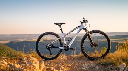 Mountain Bike on a Hilltop at Sunset