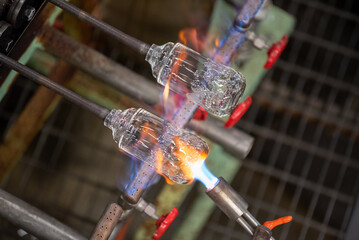 Glass manufacturing with torch