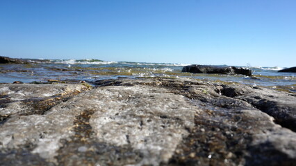 Blue Waves Crashing on Rocky Shoreline in Door County