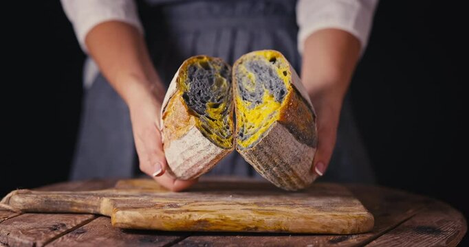 Homemade crusty sourdough bread oven baked and woman baker