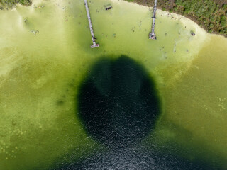 Laguna Kaan Luum aerial view. Located just outside Tulum Mexico is a lagoon with shallow clear waters popular among locals and tourists alike. © demerzel21