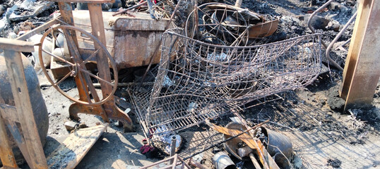 fire damage, burnt belongings of pavement dwellers or footpath