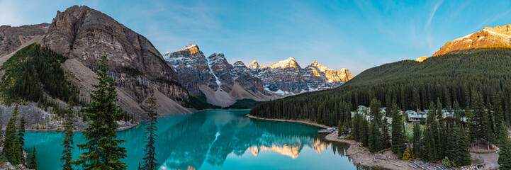 Incredible sunrise scenes at Moraine Lake, Banff National Park during fall, autumn with stunning, popular tourism spot in the Canadian Rockies. 