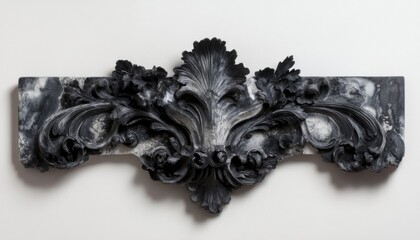 Obraz premium Black and white ornate sculpted design on a white background.